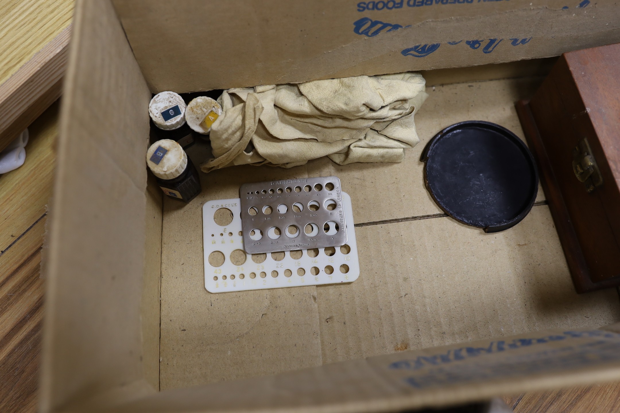 A quantity of various weighing scales, pots and prints